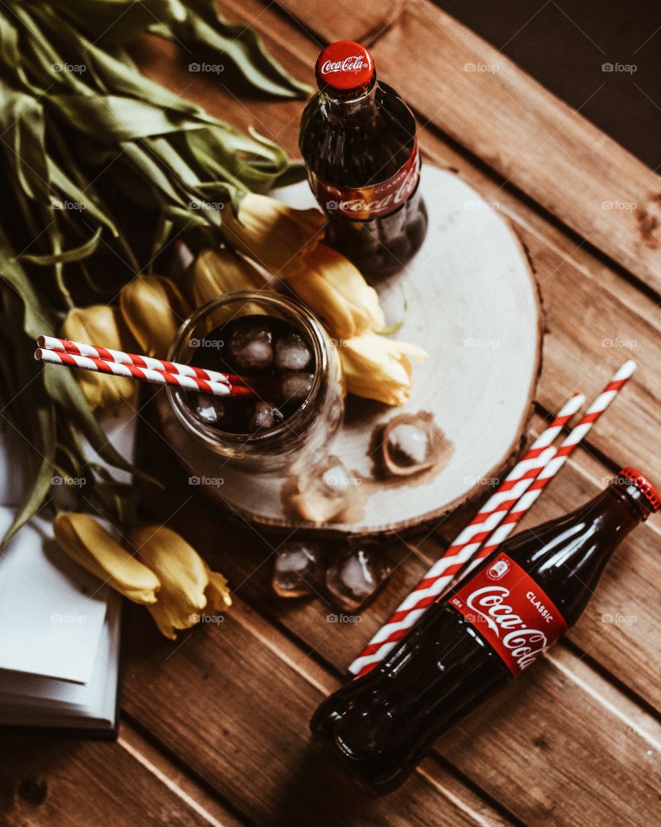 flatlay with coca cola and tulips