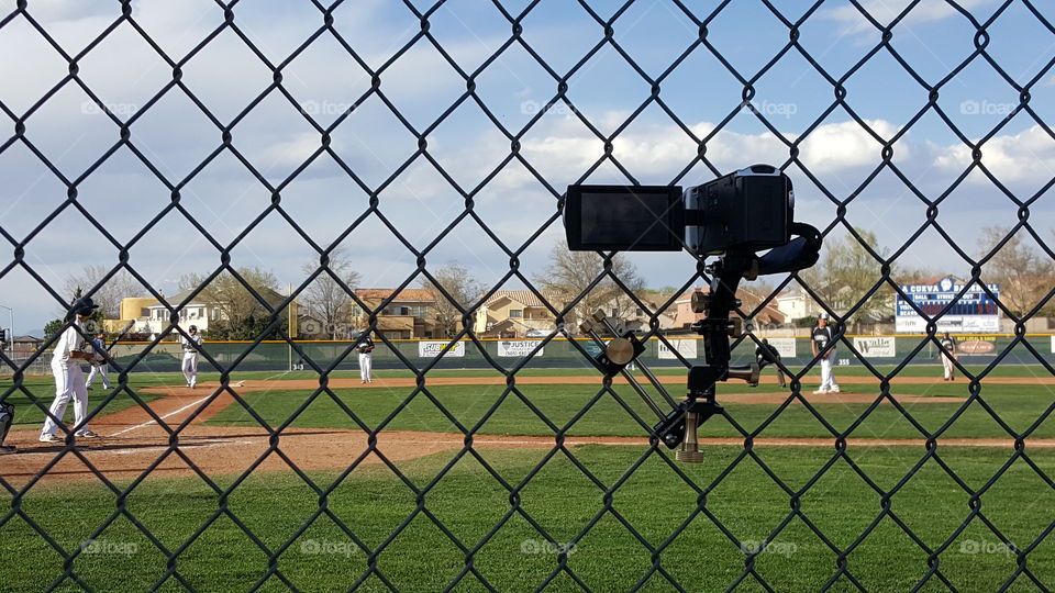 Video the action at the baseball game