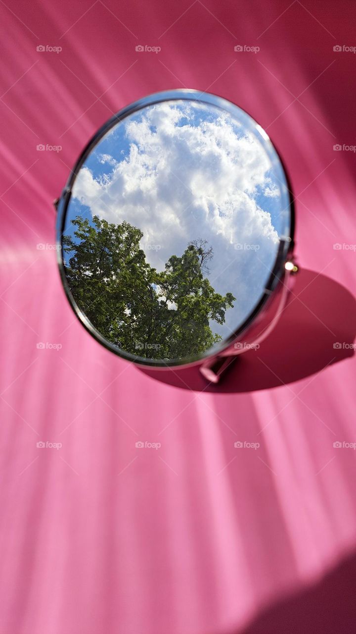 reflection of the sky in the mirror
