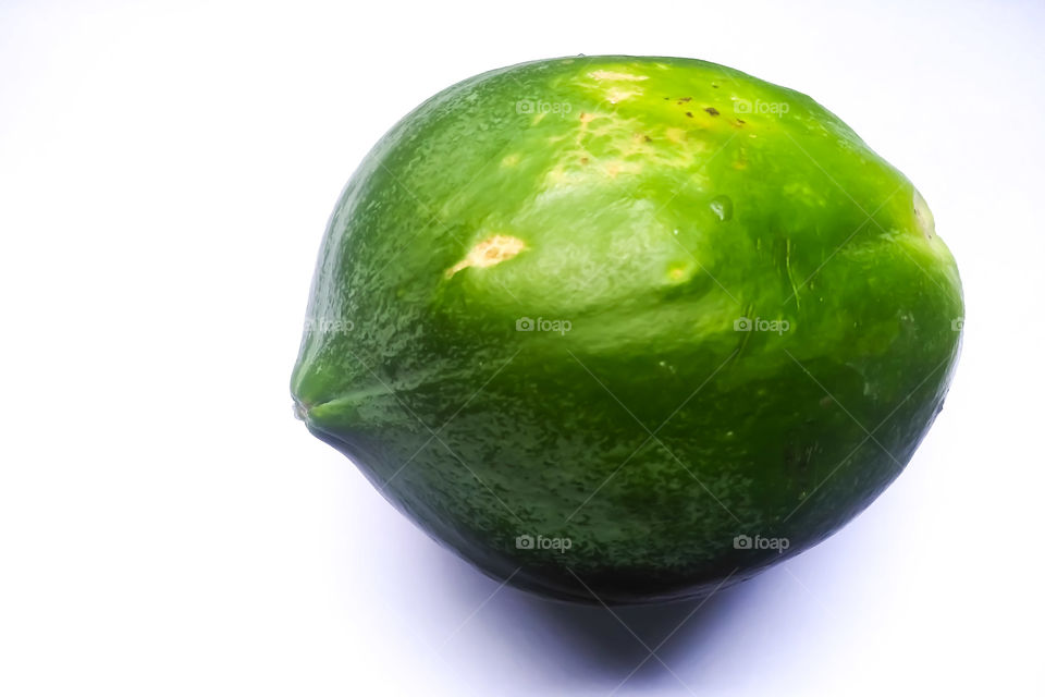 Whole Papaya fruit on white background