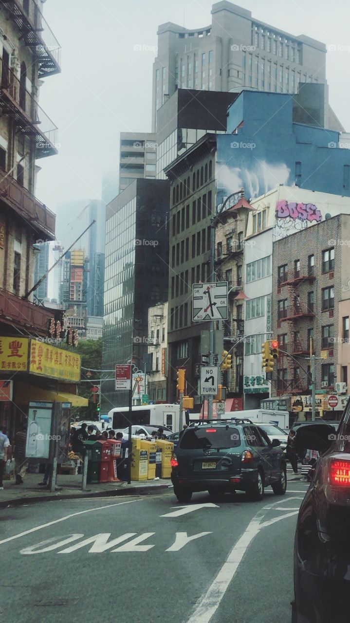 Crowded Chinatown Street foggy sky