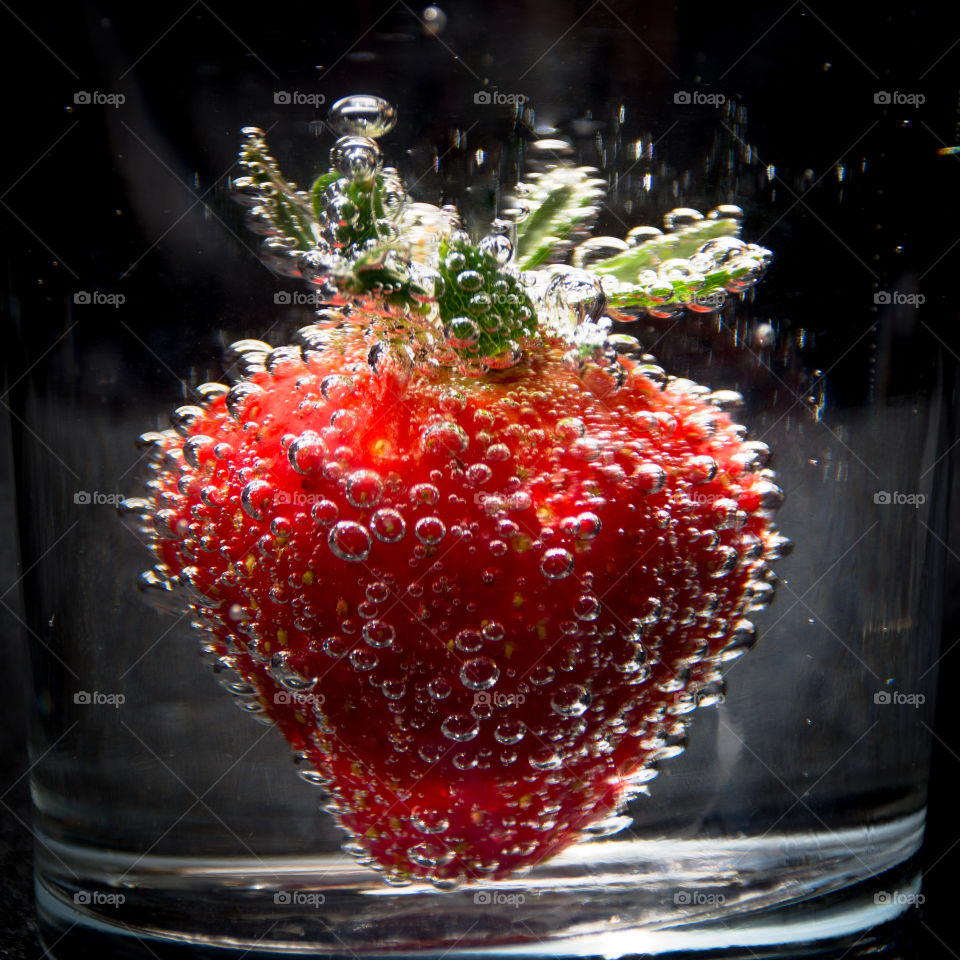 Strawberry in Soda Water with Bubbles