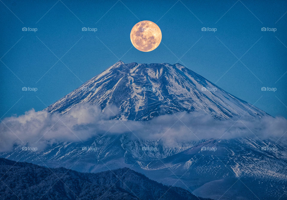 Full moon over Fuji mountain