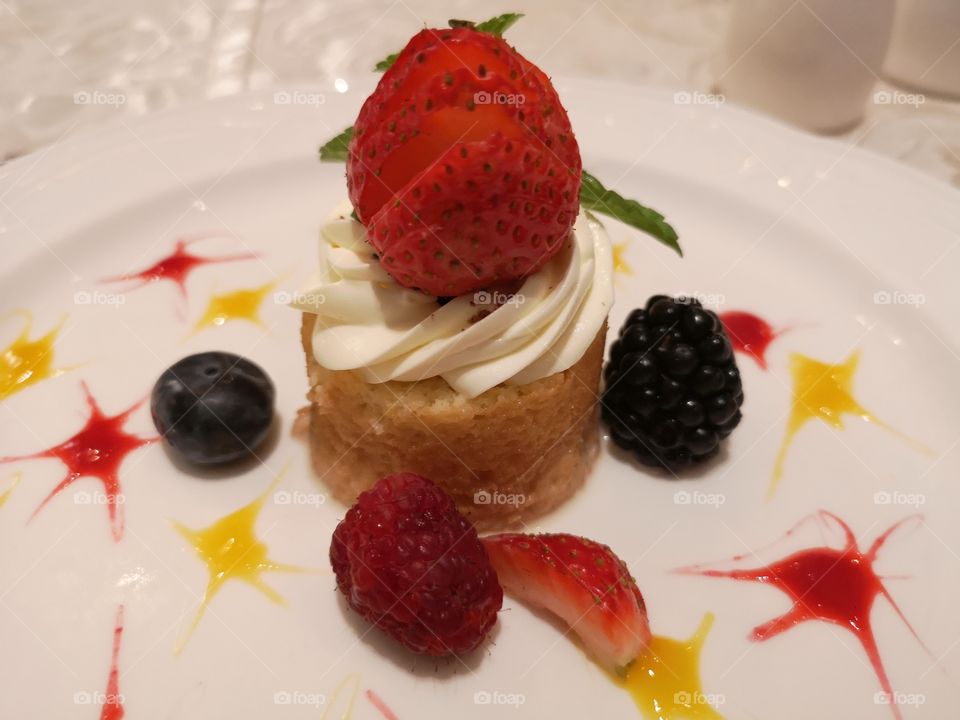 Tres Leches Cake with Butterscotch and berries