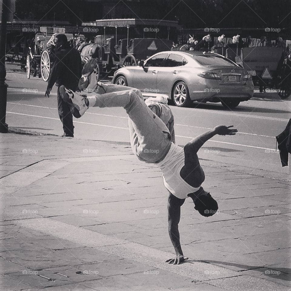 A bboy in New Orleans. A breakdancer (bboy) performing on the streets of New Orleans. 