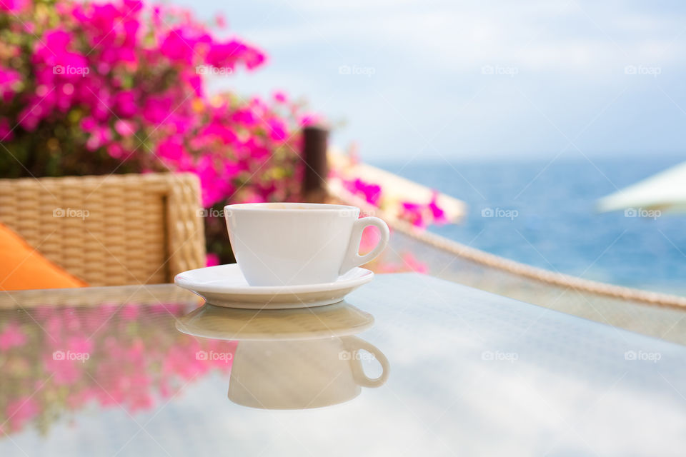 Close-up of coffee cup on table