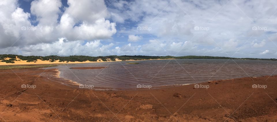 Lake, sand and nature in red in Brazil