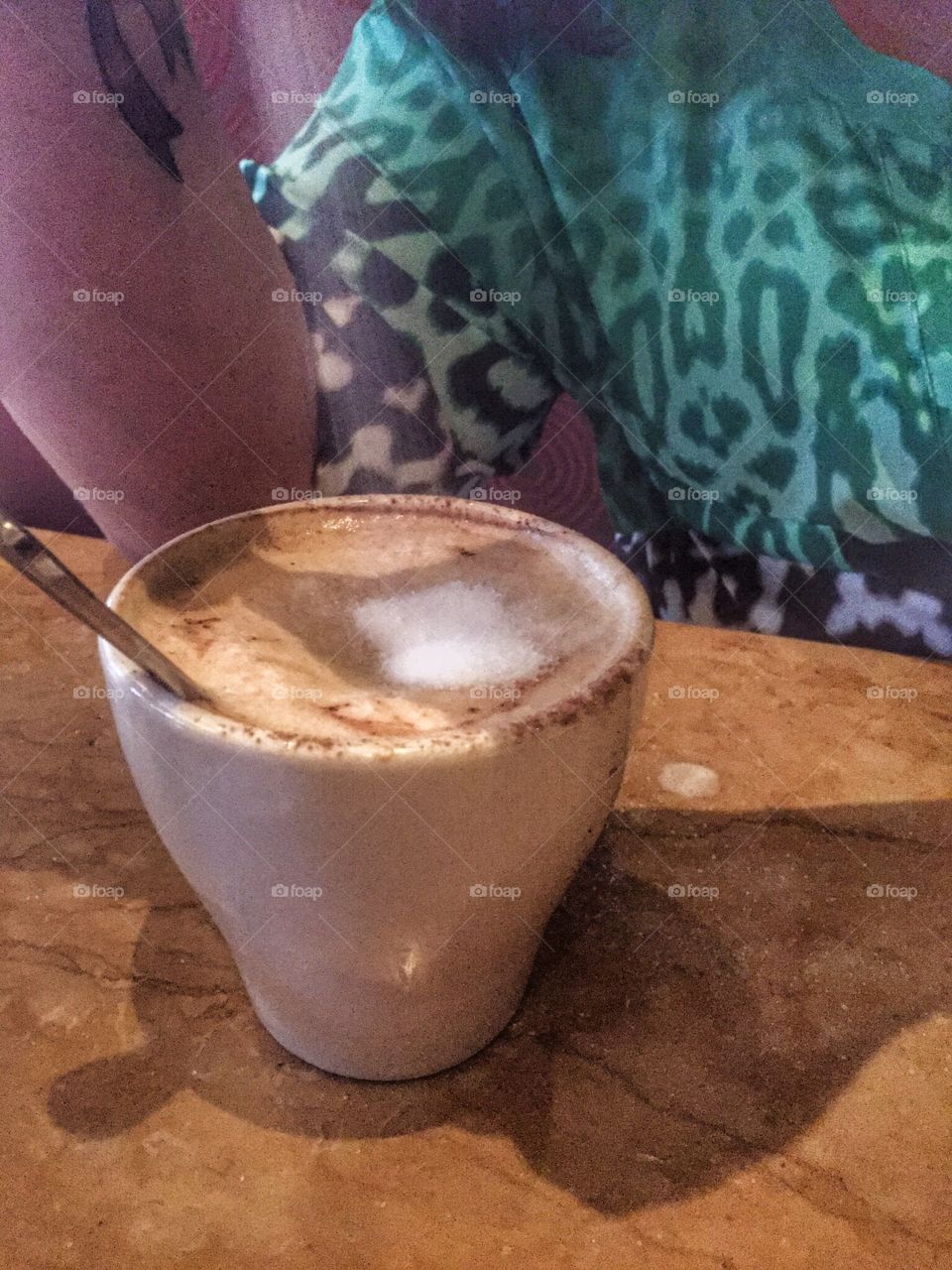 Espresso. A woman enjoying an espresso 