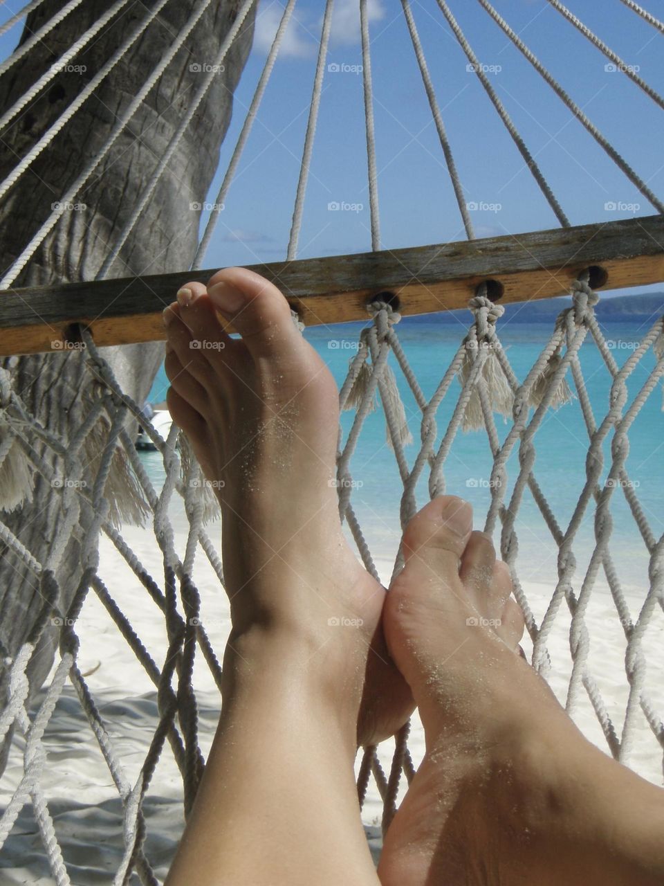 Best summer ever chilling on a hammock looking at turquoise waters of Jost Van Dyke BVI