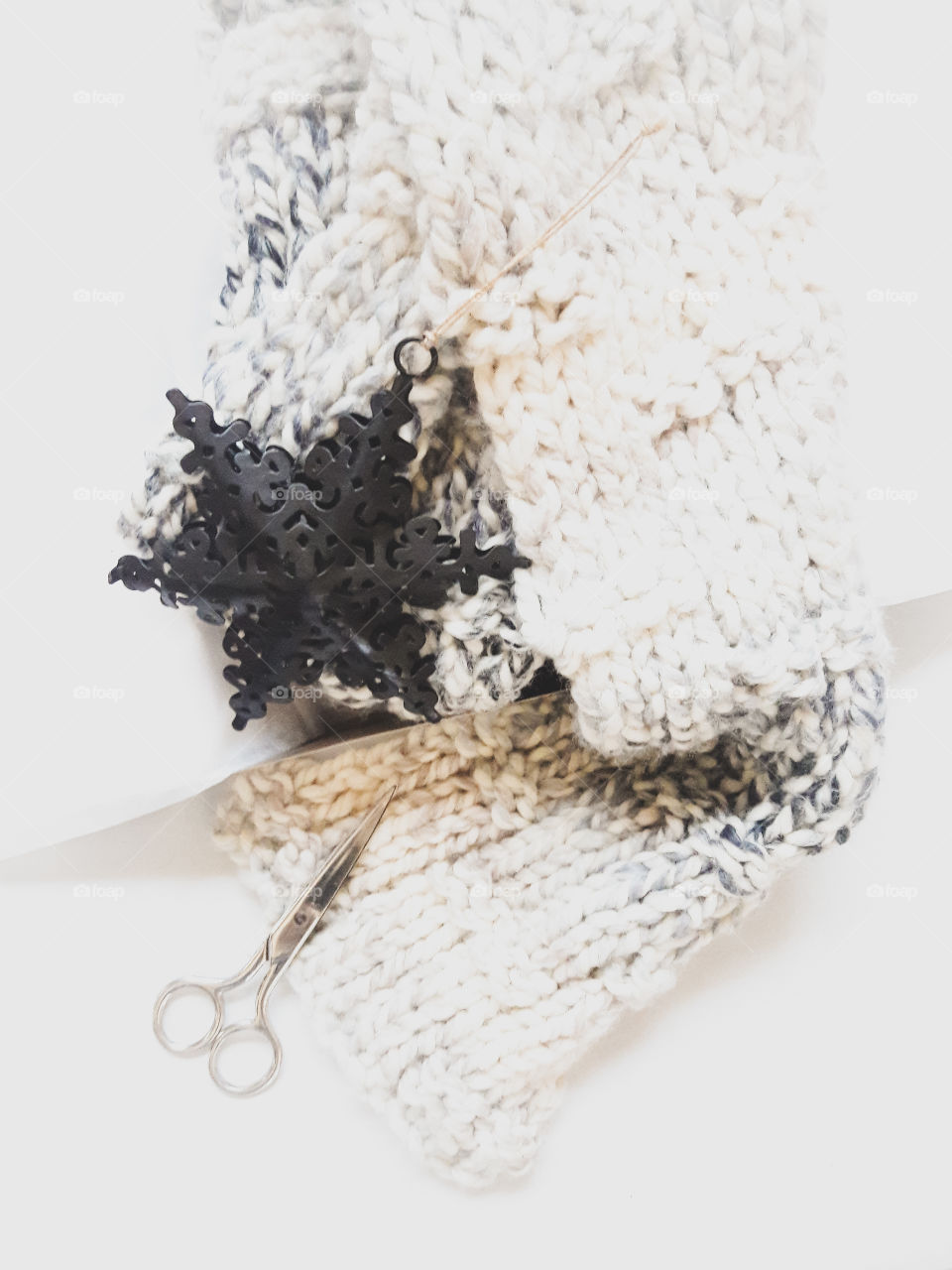 Wrapping a scarf for Christmas.