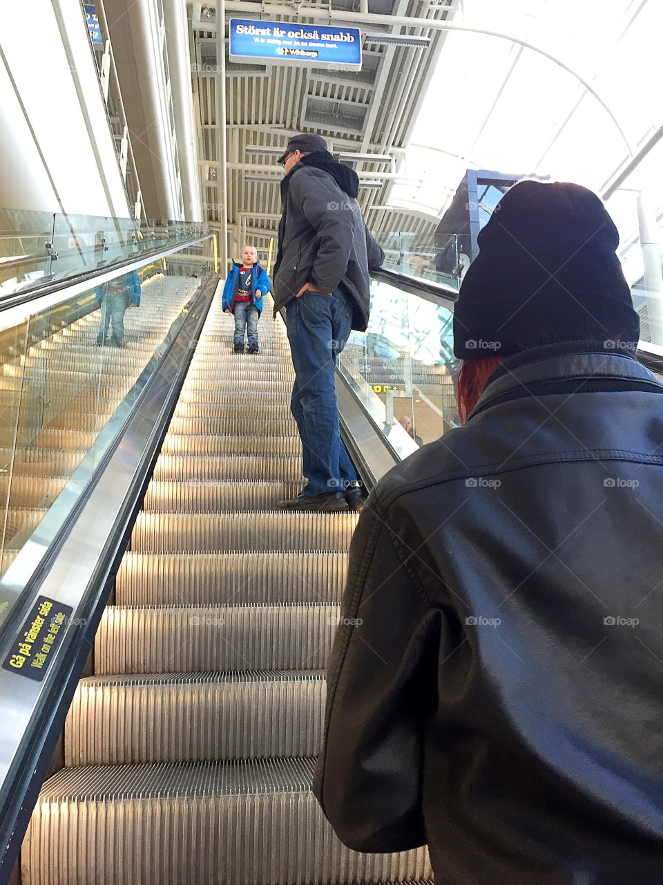 People in a escalator