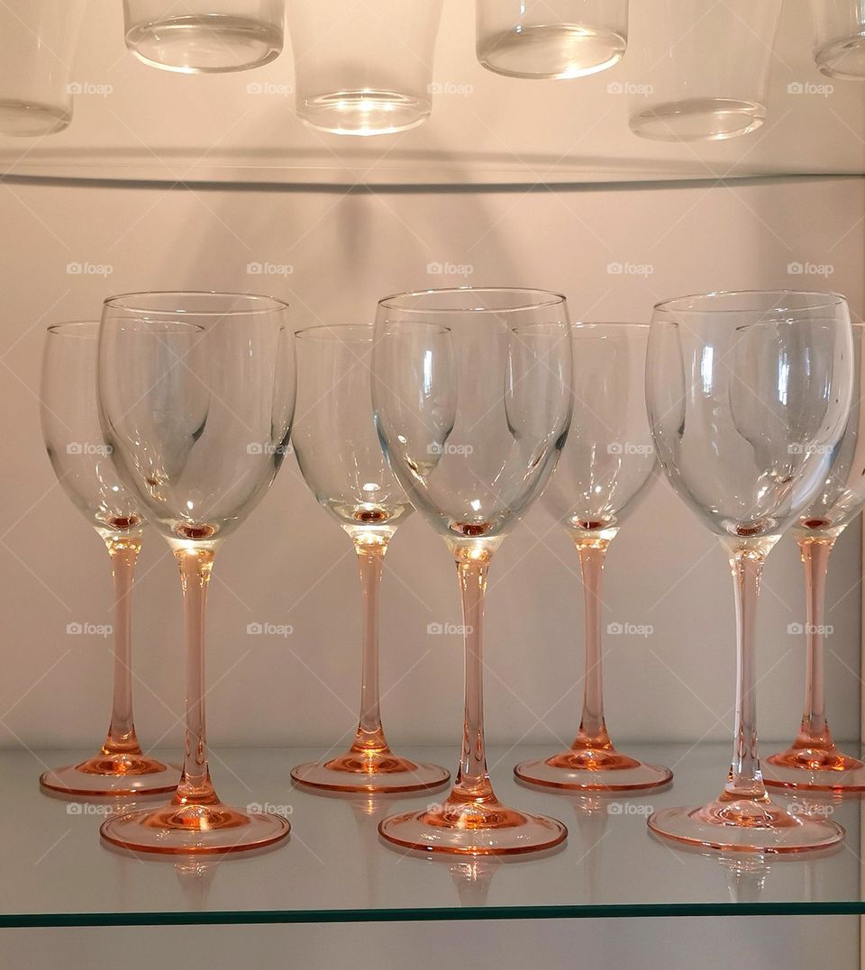 Wine glasses in display cabinet