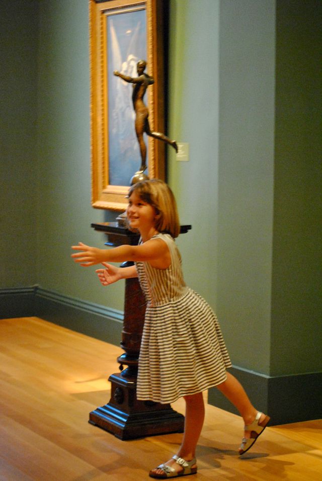 Cute little girl with arms outstretch