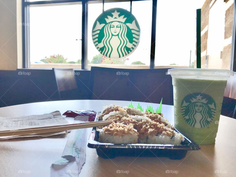 Lunch at Starbucks is green Tea Frappuccino & sushi 🍣