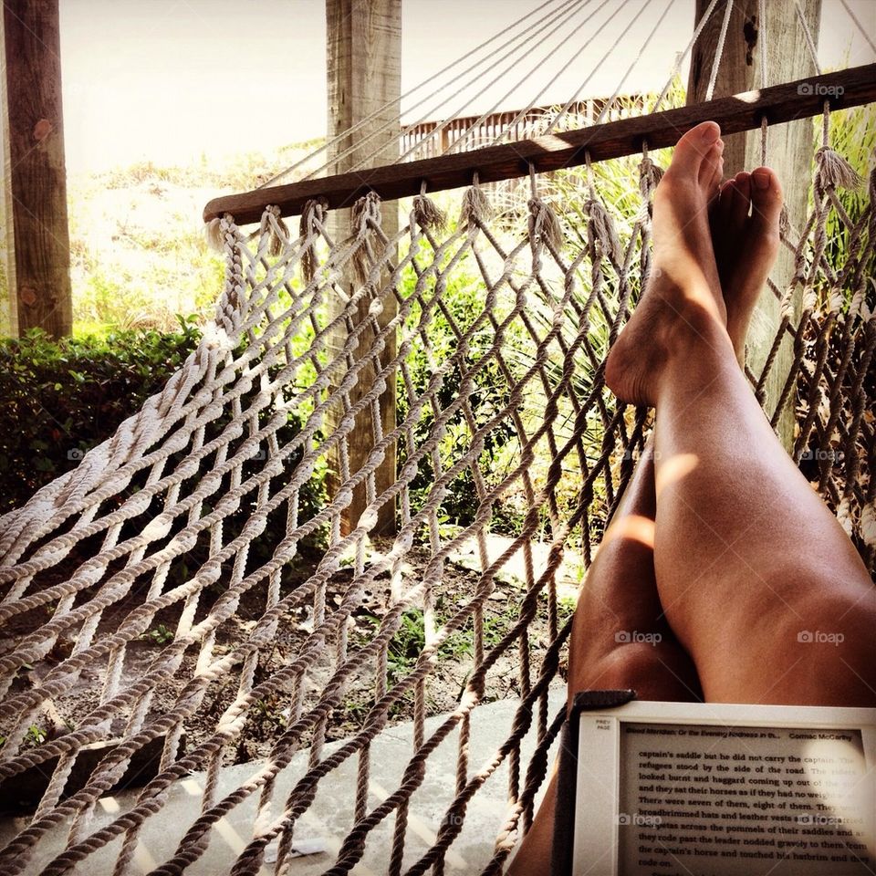 Reading Blood Meridian in a hammock at the beach
