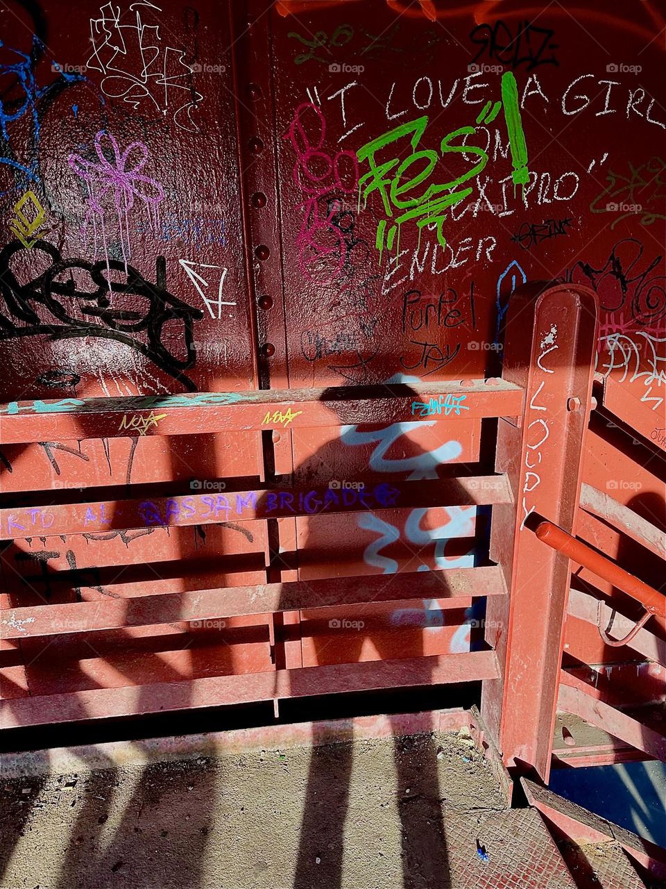 The red metal staircase of the “Pulaski Bridge” at “Newtown Creek” in LIC, Queens shows the most intricate patterns in the late afternoon sun that casts strong shadows onto its “Bauhaus” inspired geometry. 2024. Hypnotic Productions