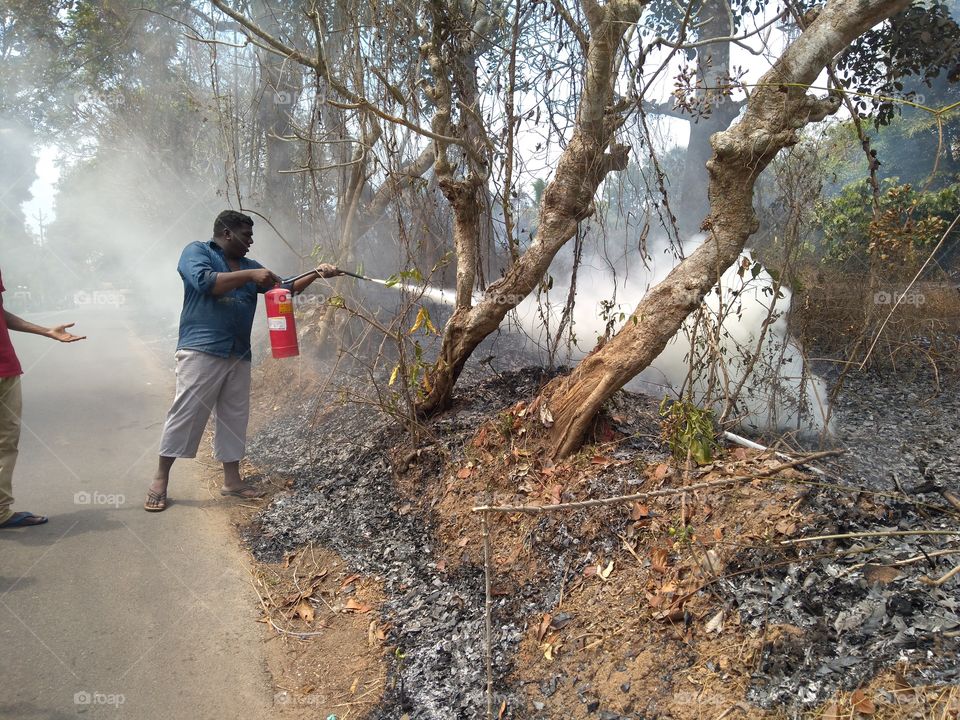 using fire extinguisher