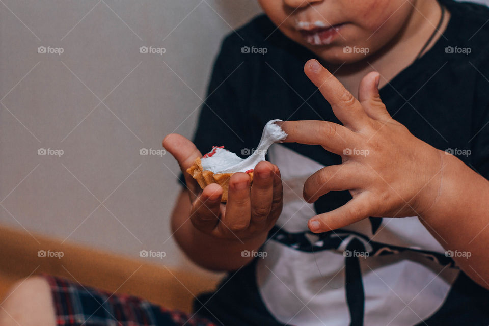 boy eats cake