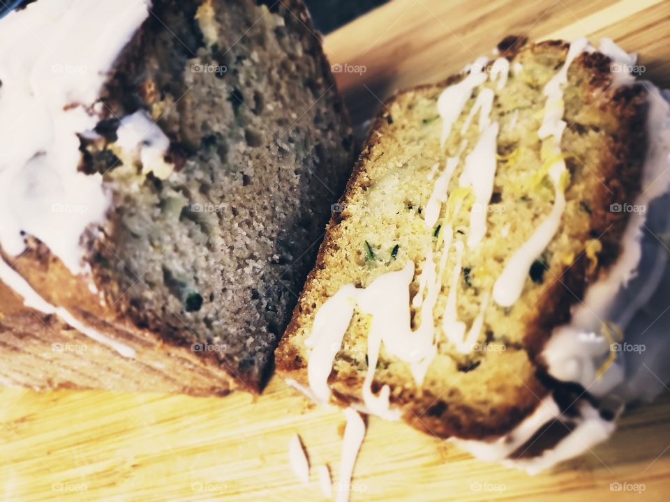 Delicious bread made from freshly harvested zucchini out of the garden with lemon drizzle. 