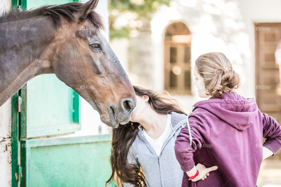 Teenage Girls With A Horse

