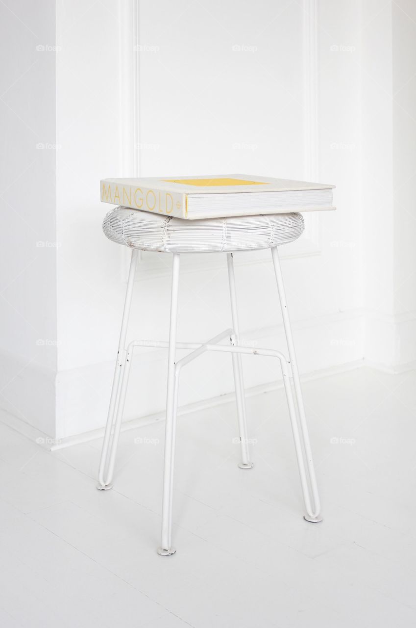 Book on a stool image.