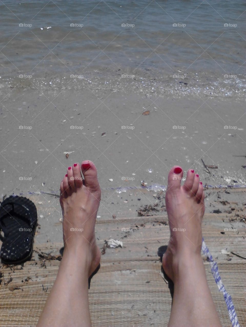 feet in the sand
