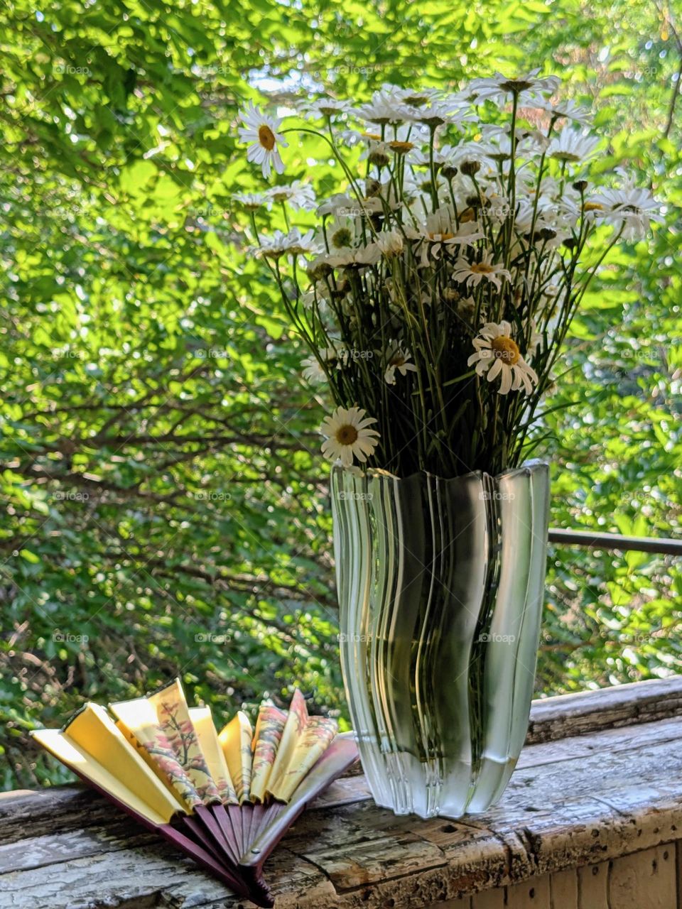 chamomiles in a vintage vase