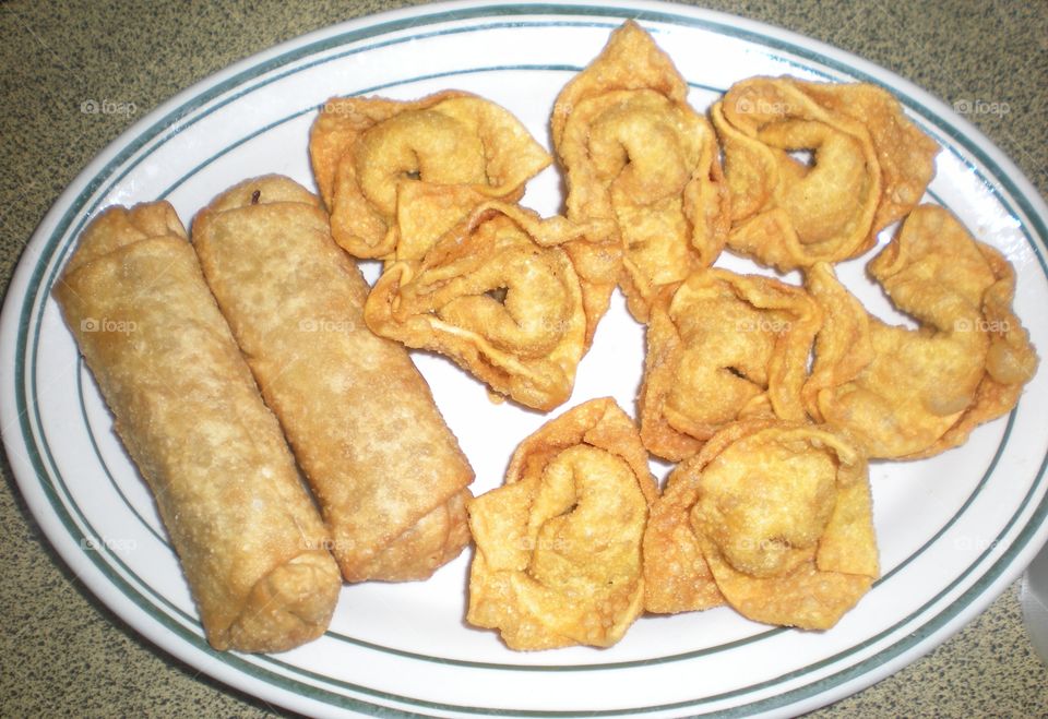 eggrolls and Crab Rangoon . Chinese fried goodness