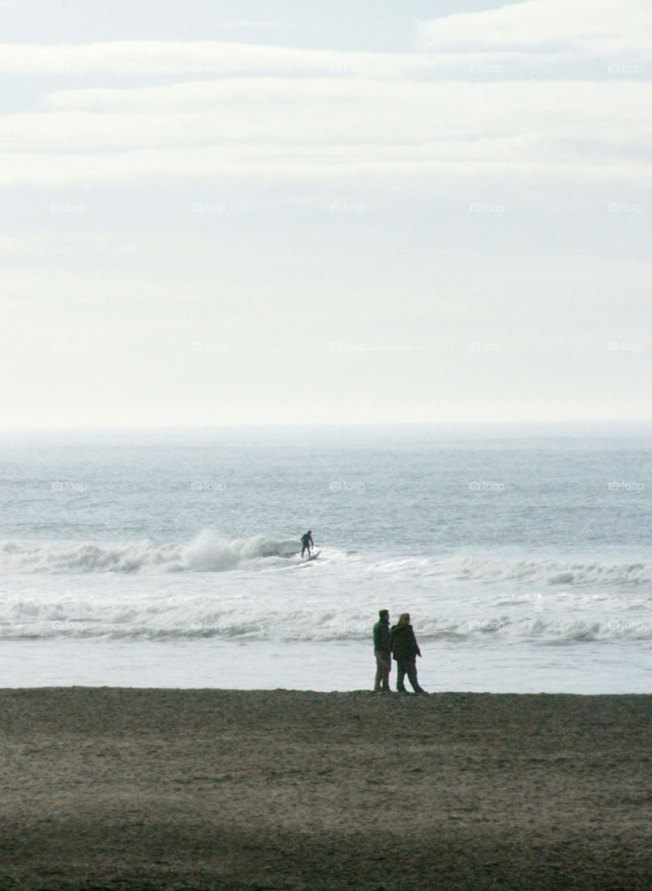 on the beach, surfer 