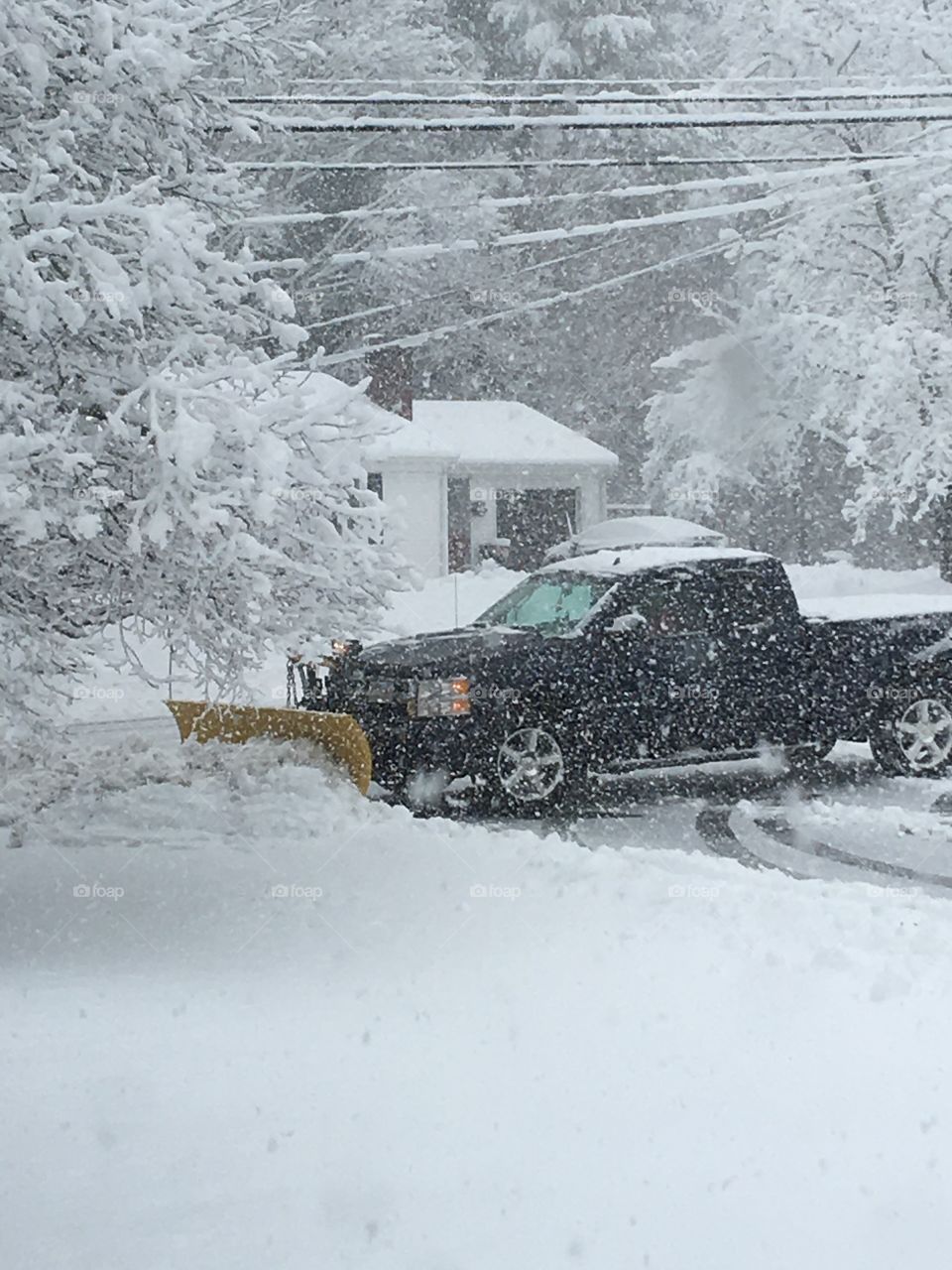 Plowing During Snowstorm New England
