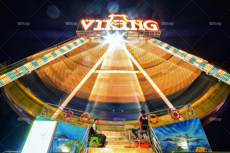 Beautiful light of playing machine in summer holiday at Bangkok countryside ,Thailand