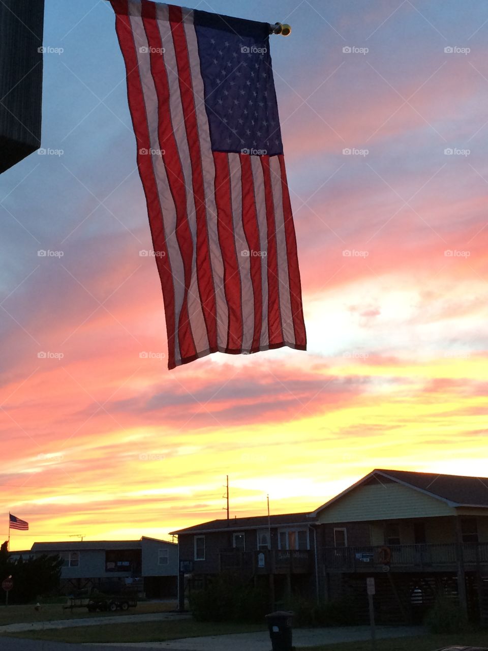 American Flag on beach cottages in Kill Devil Hills North Carolina 