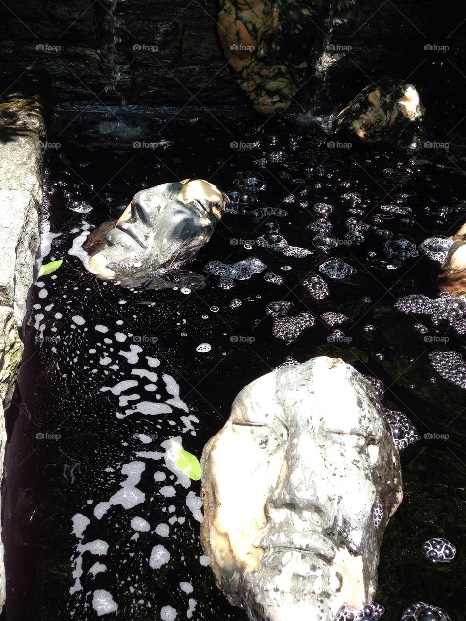 Faces in the fountain 