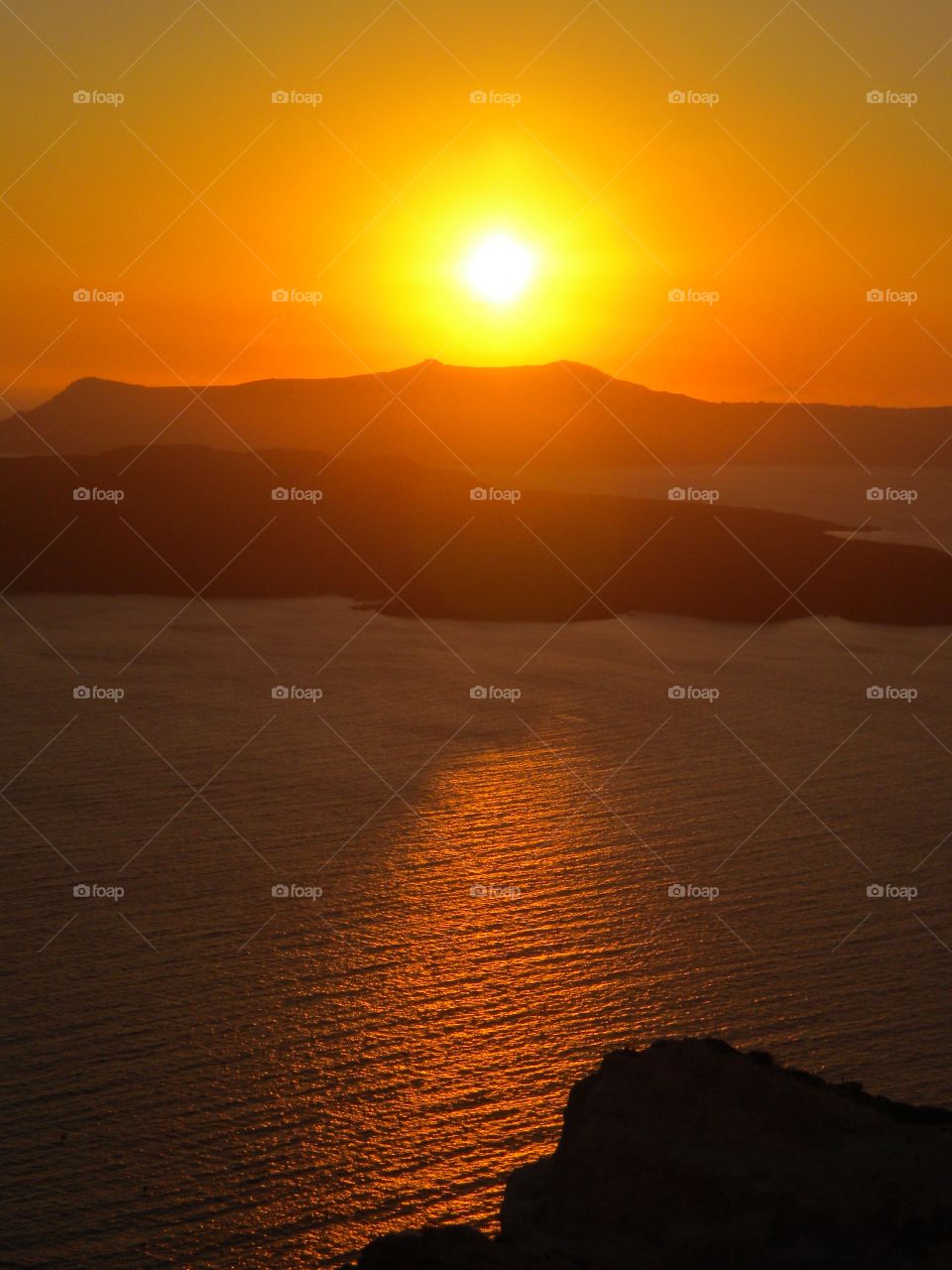 Reflection of sunset at santorini