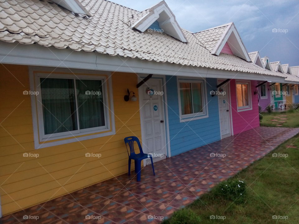 colorful resort houses. colorful resort houses in rainy storm day