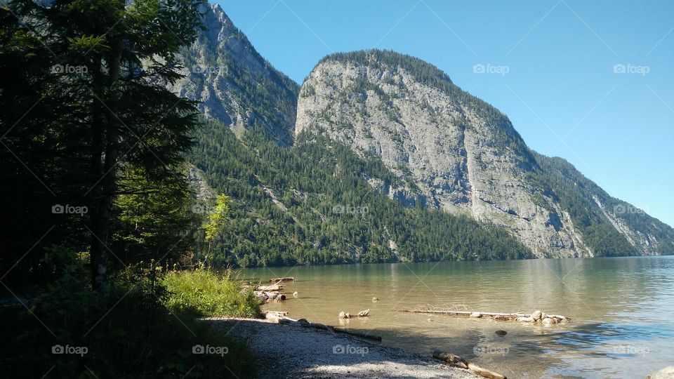 Königssee at it's whole beauty in St. Bartholomä (Bartholomew). Behind you can see a part of the Mountain Watzmann and it's famous Ostwand (east Wall)