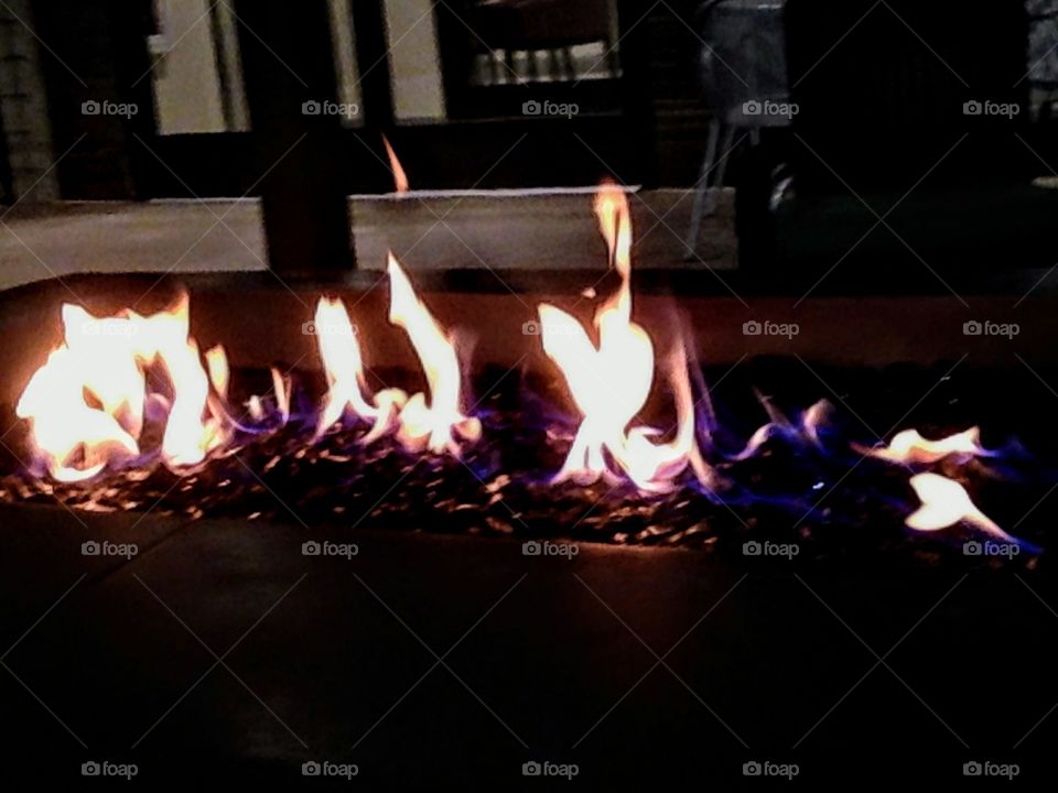 can you see the body laying in the flames