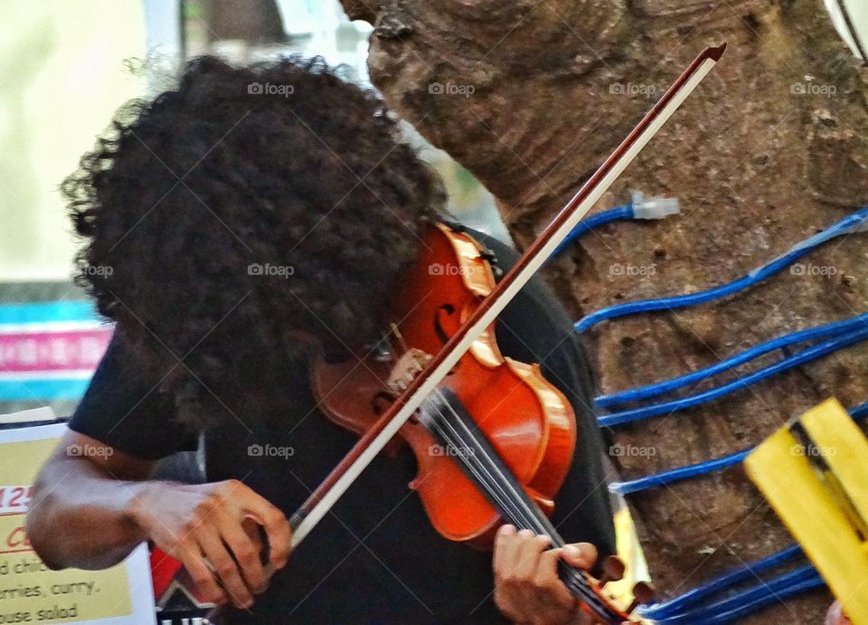 Playing The Violin. Street Musician In Mexico Playing The Violin
