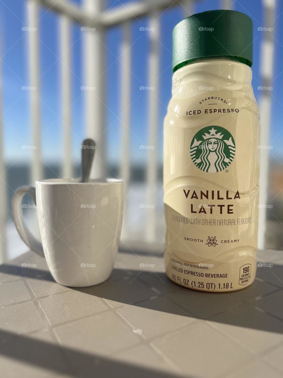 Vanilla latte Starbucks. Cup of chilled coffee. 