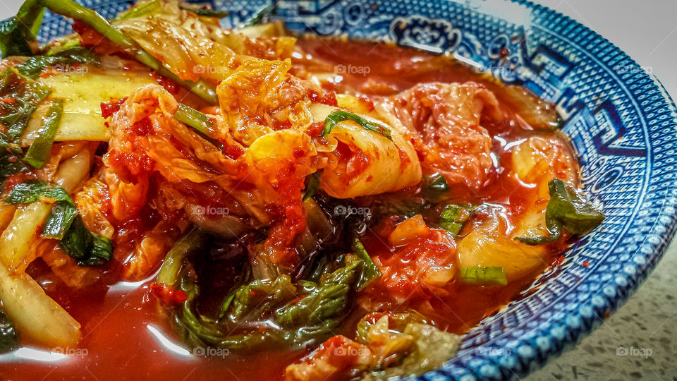 Korean kimchi or gimchi . A traditional fermented side dish made of vegetables with a variety of spicy seasonings. 