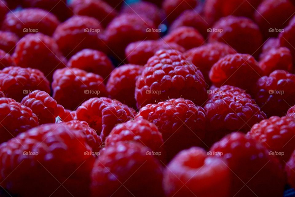 Closeup of fresh raspberries in natural light 