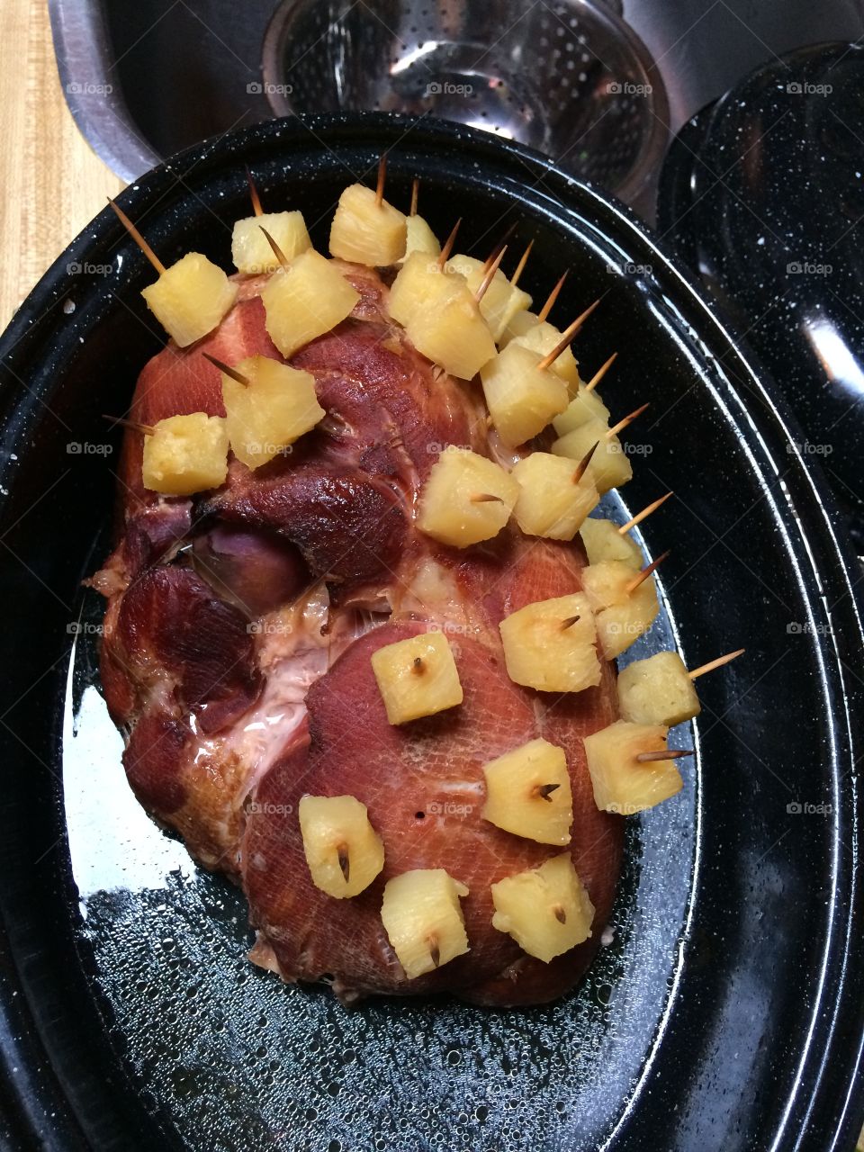 Ham cooked in a crock pot with pineapple on top 