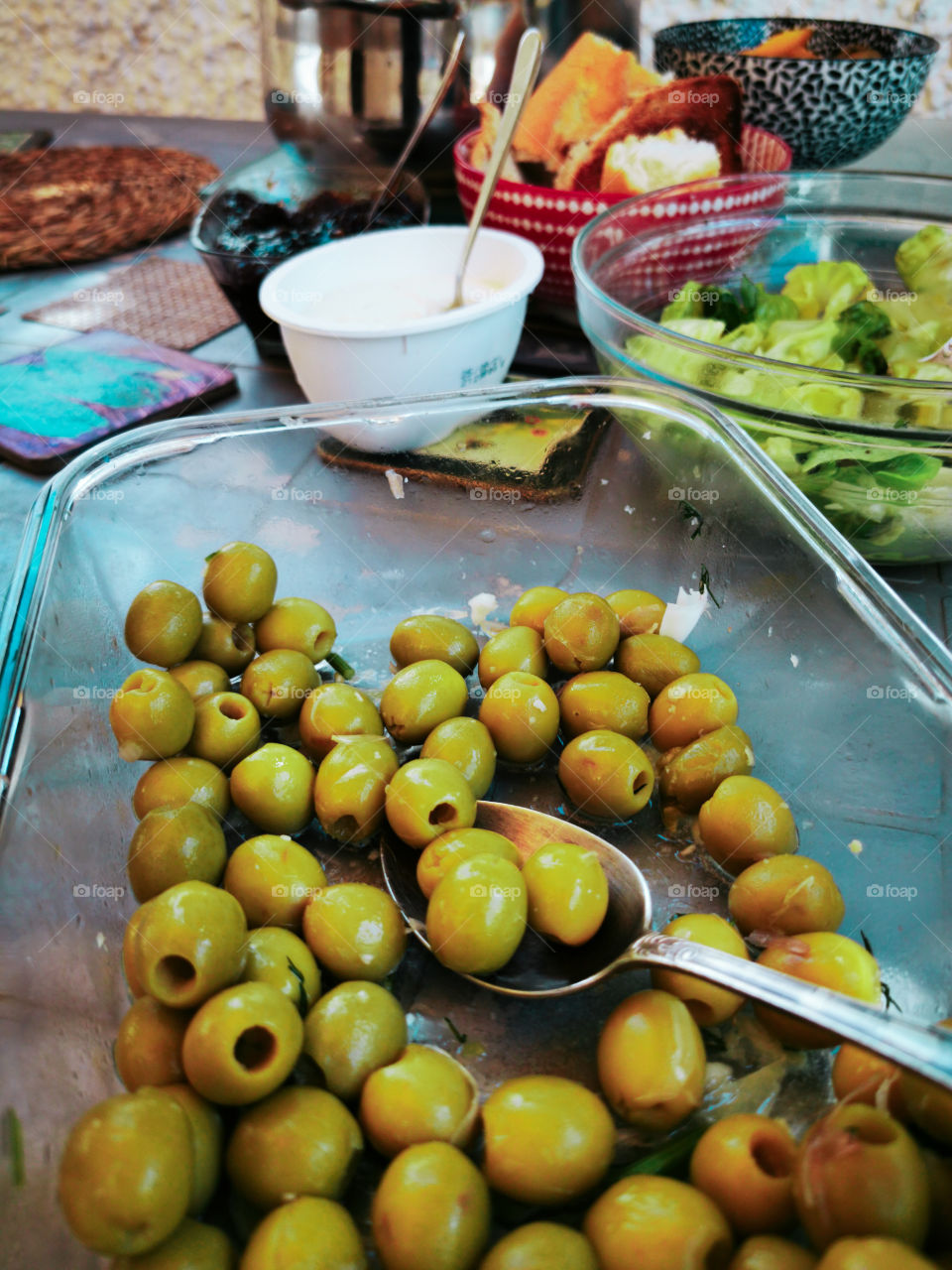 Olives and other foods on the table