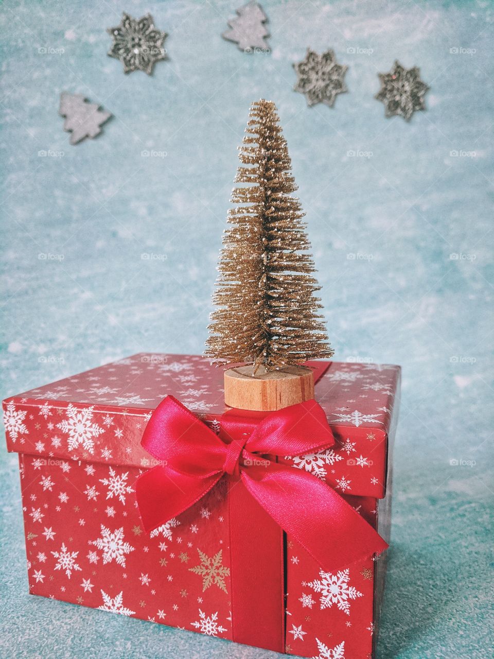 Christmas and New Year background with Christmas tree, decorations and red gift box. Flat lay. Top view.