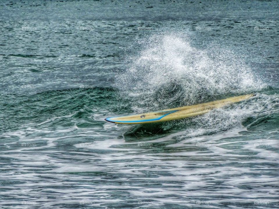 Surfboard Lost Its Rider. Surfing Wipeout
