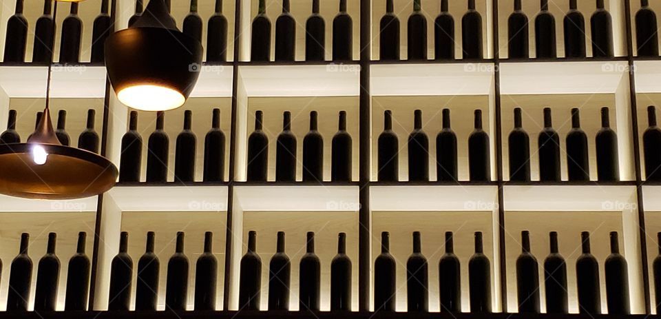 wine bar display bottles france