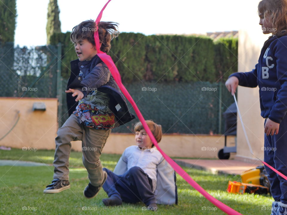 Kids having fun and jumping