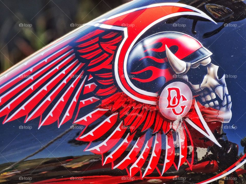 Hells Angels Motorcycle. Red And White Colors And Death's Head Logo Of Hells Angels Motorcycle Club On A Harley
