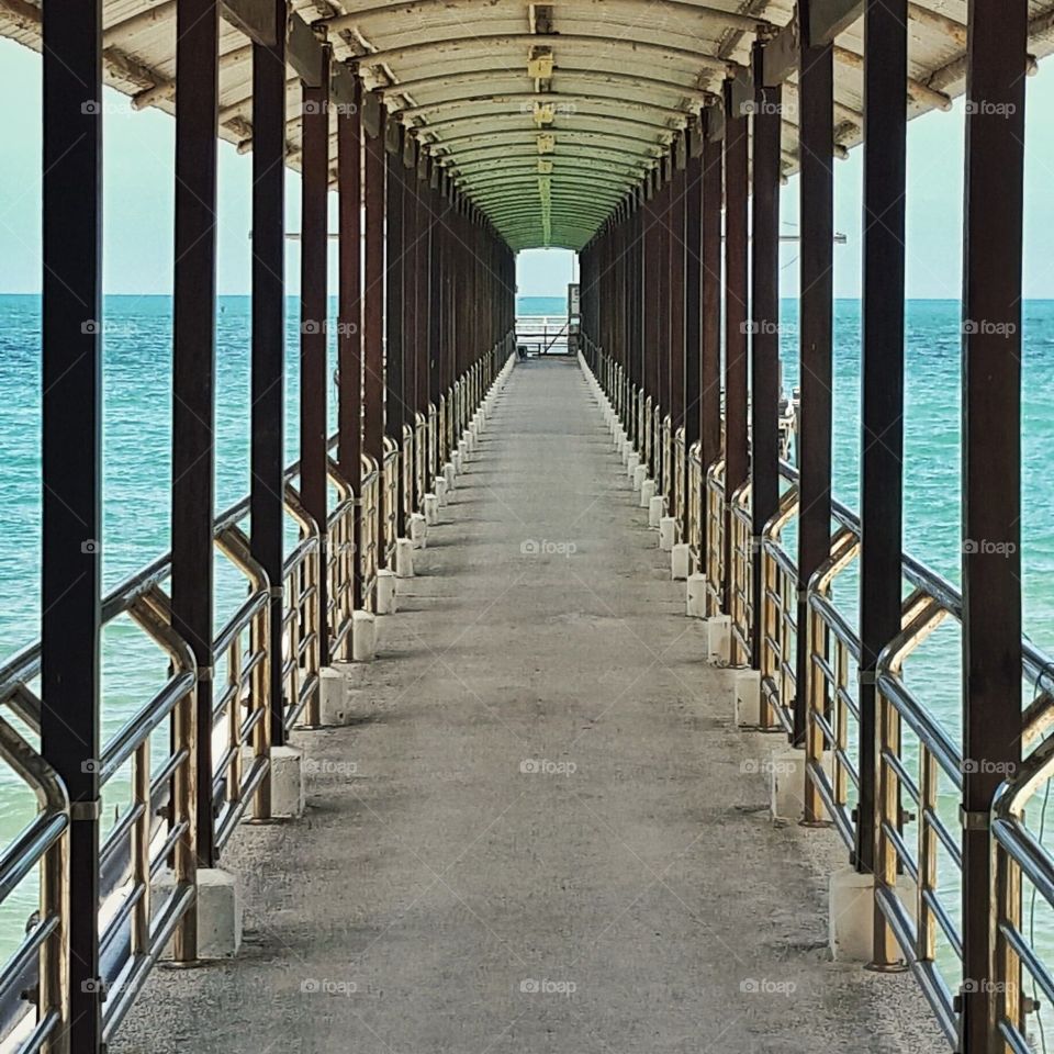 perspective shot of a pier in Indonesia.