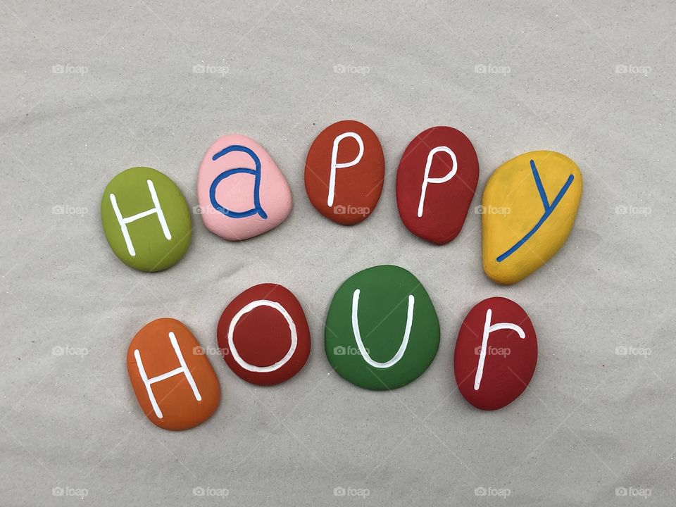 Happy Hour text with colored stones